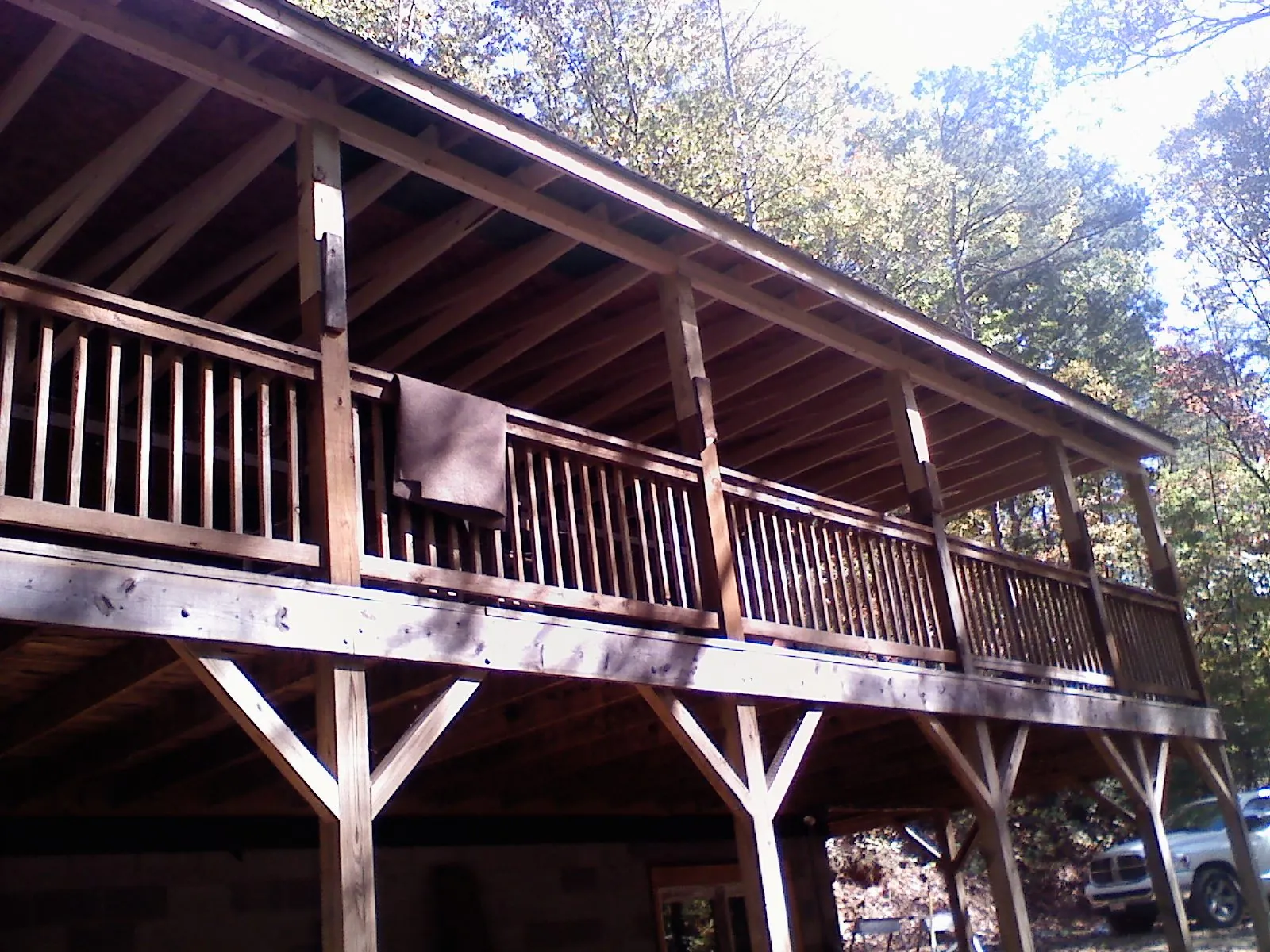 Timber framing under a new elevated porch and deck — Roof Leak Repair in Matamoras by Roofing Brothers